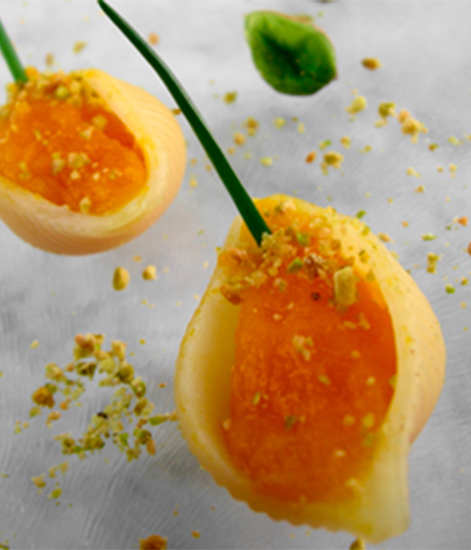 Schelppasta met pompoenpuree en pistachenootjes